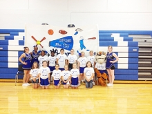 Linden-Kildare cheerleaders Jordann Schuler, Shenari Green and Christina Roberts help the 10-12 year olds “knock spirit out of the park” on baseball day during the Mini Cheer Camp held by cheer coordinator Kristina LeJeune. The camp boasted 73 girls with the motto “we cheer year round”.