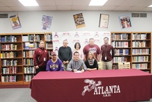 Atlanta senior Chase Musgrove sits surrounded by family and coaches as he signs his letter of intent to play baseball with Panola College. Seated from (L to R) Jay Musgrove, Chase and Pat Musgrove. Standing from (L to R) Atlanta AD Matt McClure, Chase’s grandparents Julian and Nelda Musgrove, American Legion coach Deray Cook and AHS baseball coach David Hooten.