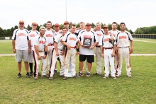 The Cass County Bank Rebels entered the 54-team Omaha Tournament and left town with the championship after compiling an 8-0 record. Head Coach Deray Cook holds the plaque surrounded by some of the best players from Northeast Texas and Assistant Coach Jeff Teague.